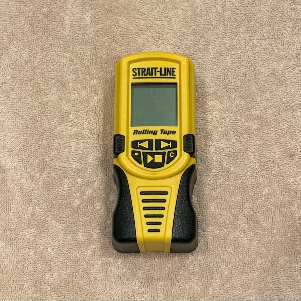 Strait-Line Electronic Rolling Tape, a digital measuring device. 
LCD screen,